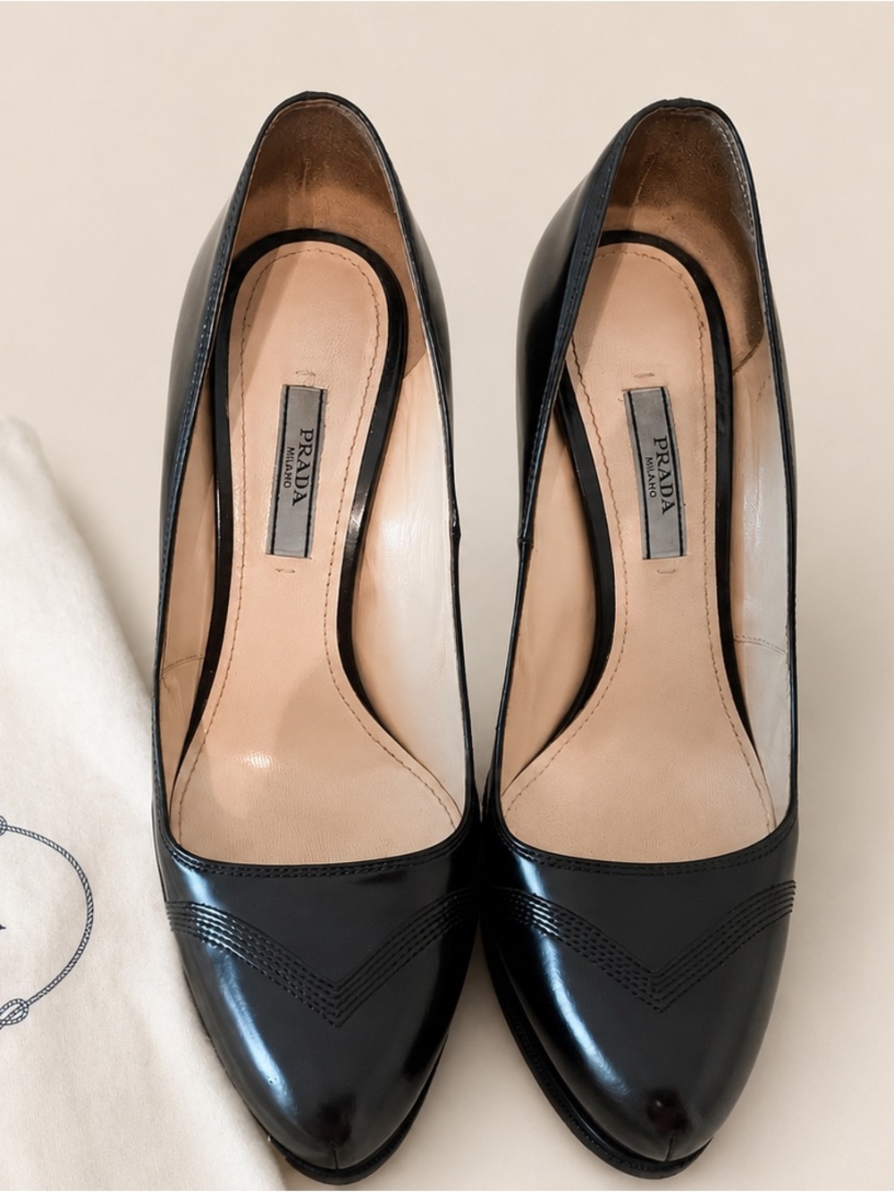 Prada Black Leather Cap Toe Pumps Heels Size 38 with Dust Bag V detail.
